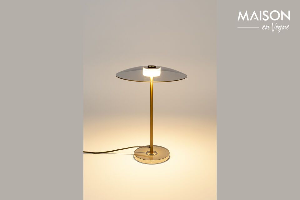 Voici la superbe Lampe à poser en verre doré Float