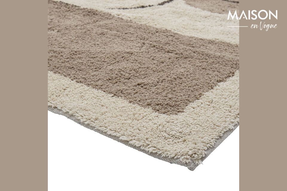 Tapis tufté en coton pour un intérieur doux et apaisant.